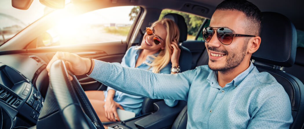 couple driving in car